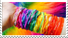 rainbow sillybands on a person's arm stamp